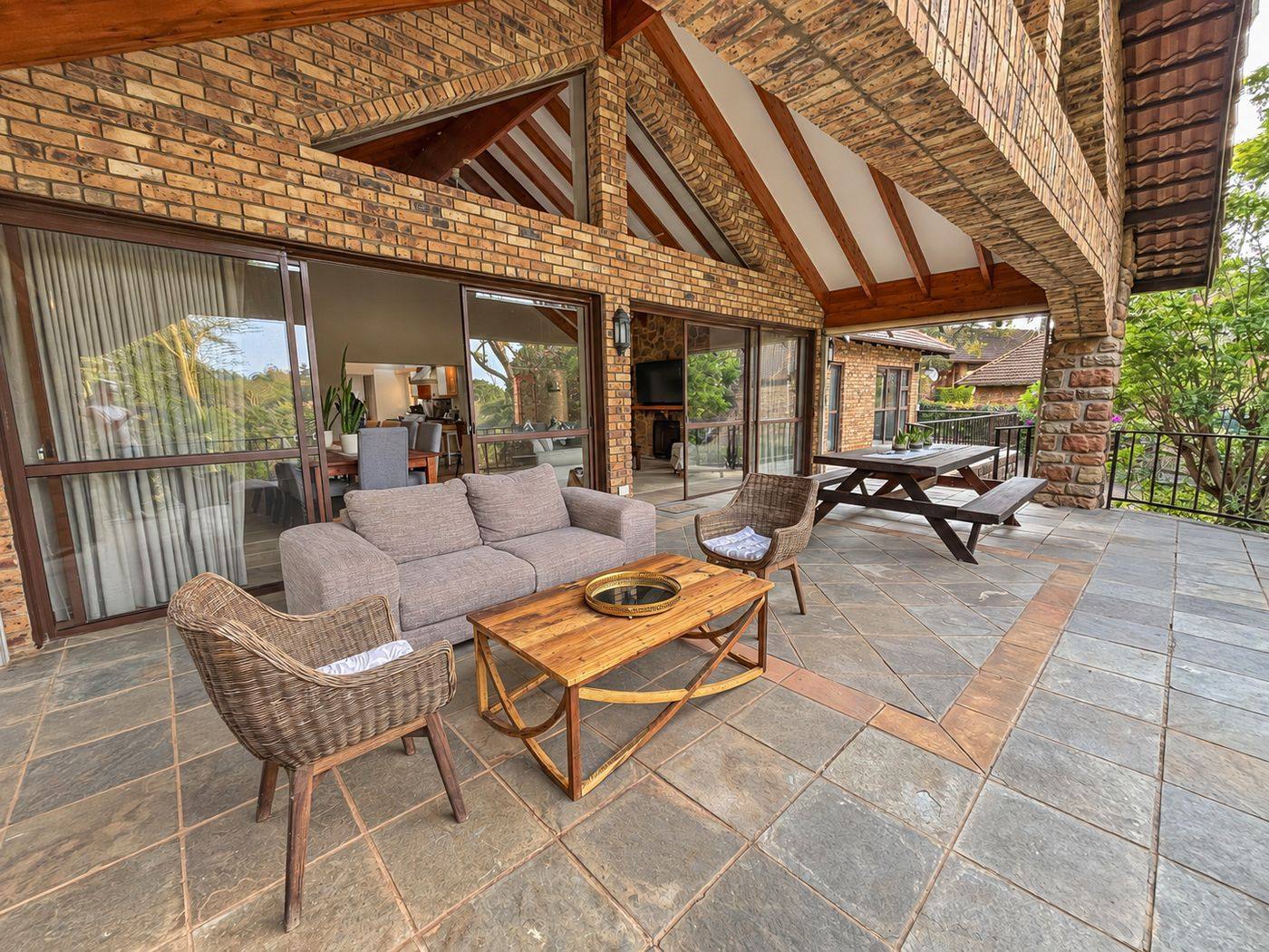 Covered patio and outdoor lounge